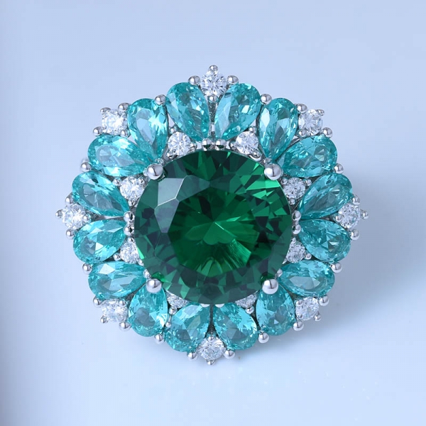 esmeralda verde redonda e ródio redondo da paraíba sobre anel de centro de prata esterlina 