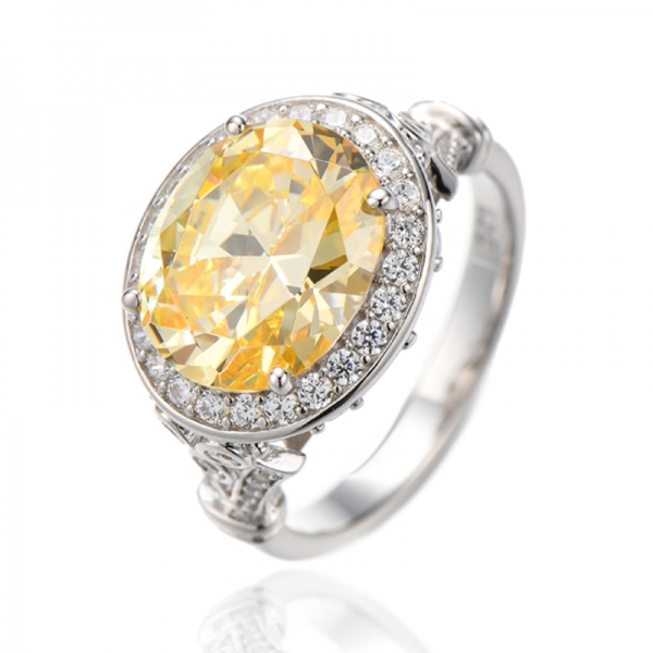 Anel oval com diamante amarelo e zircônia cúbica branca marquise e ródio em prata 